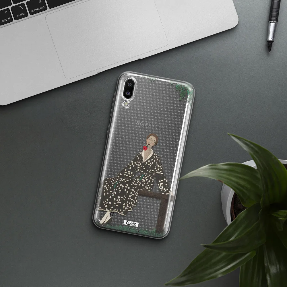 a woman sitting on a bench Samsung M10 Clear TPU Case