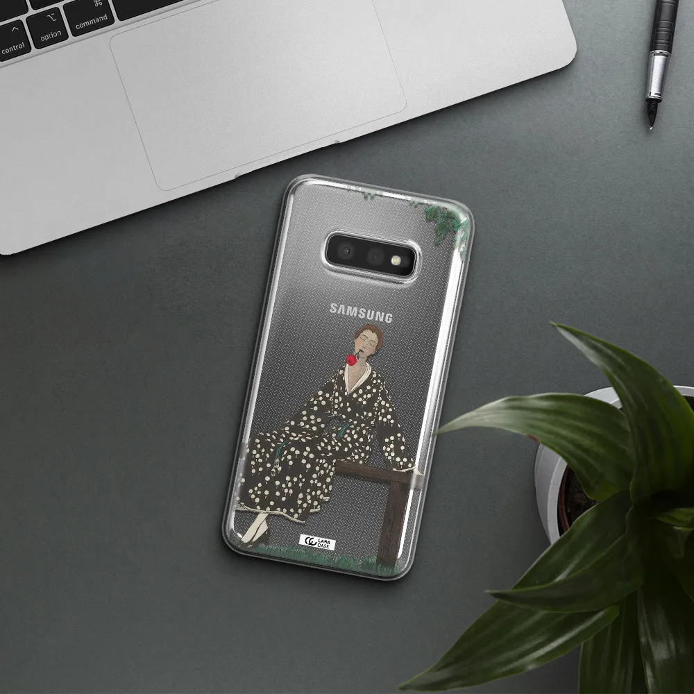 a woman sitting on a bench Samsung S10e Clear TPU Case
