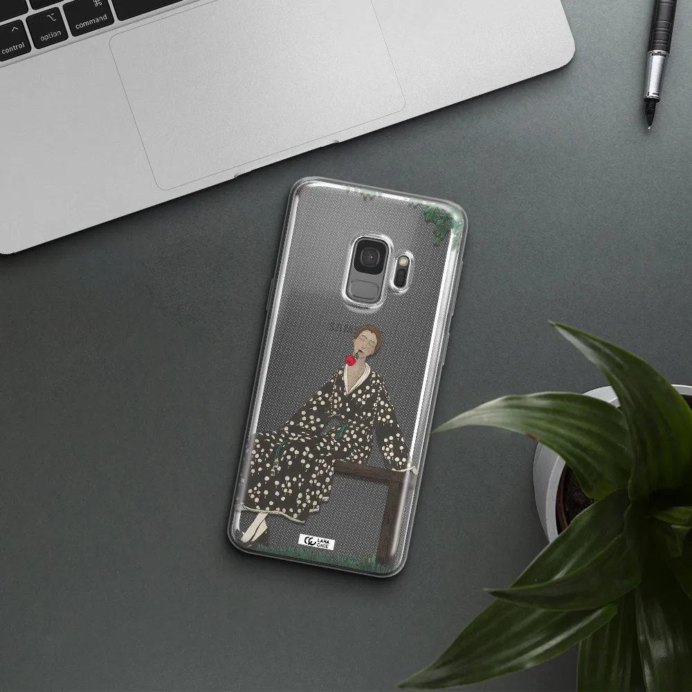 a woman sitting on a bench Samsung S9 Clear TPU Case