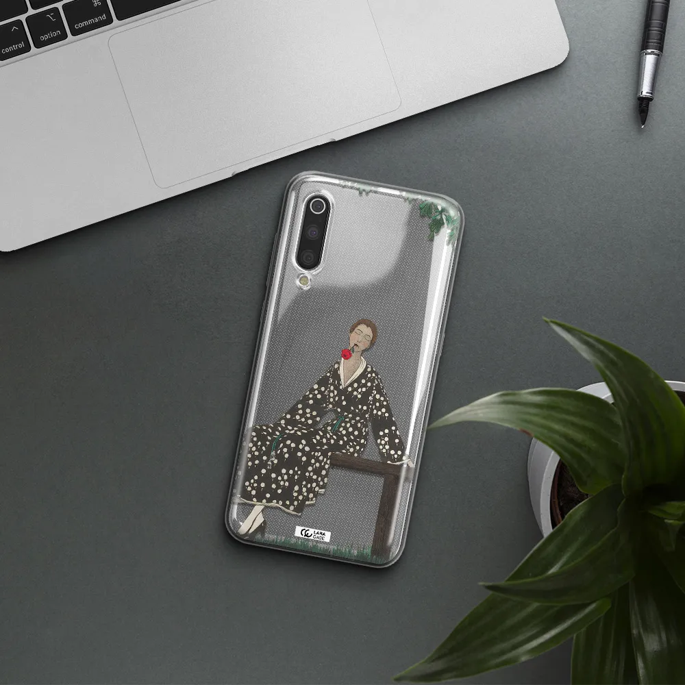 a woman sitting on a bench Xiaomi Mi 9 Clear TPU Case