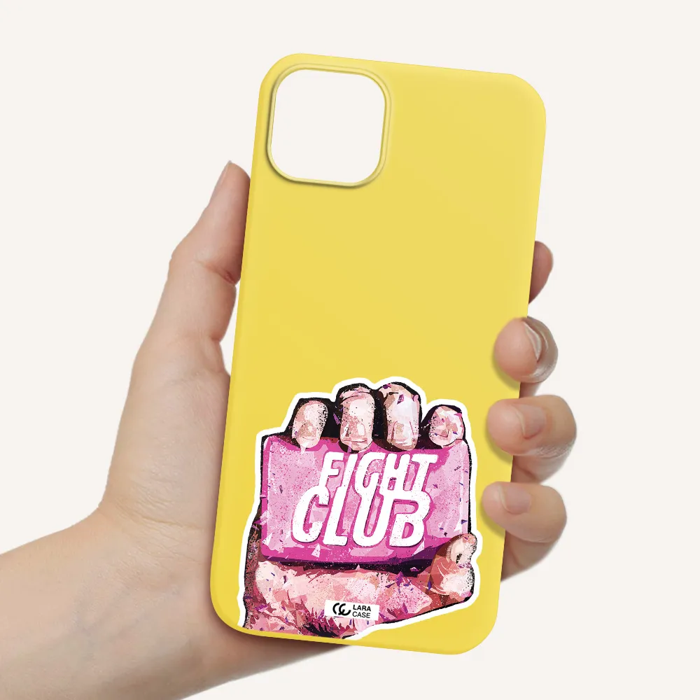 a hand holding a pink bag Apple iPhone 14 plus Silicone canary yellow Case