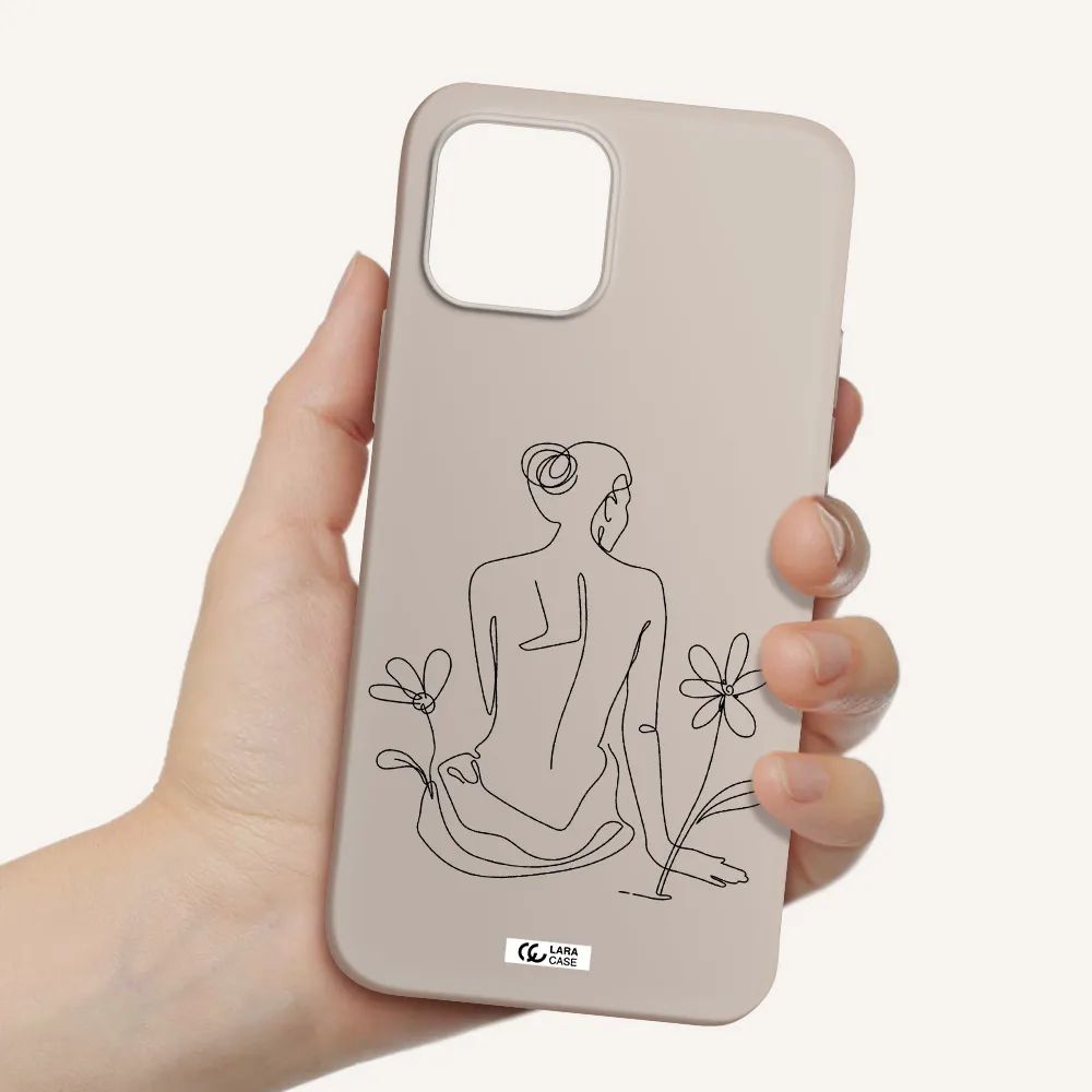 a woman sitting on a flower Apple iPhone 12 Silicone Stone Case