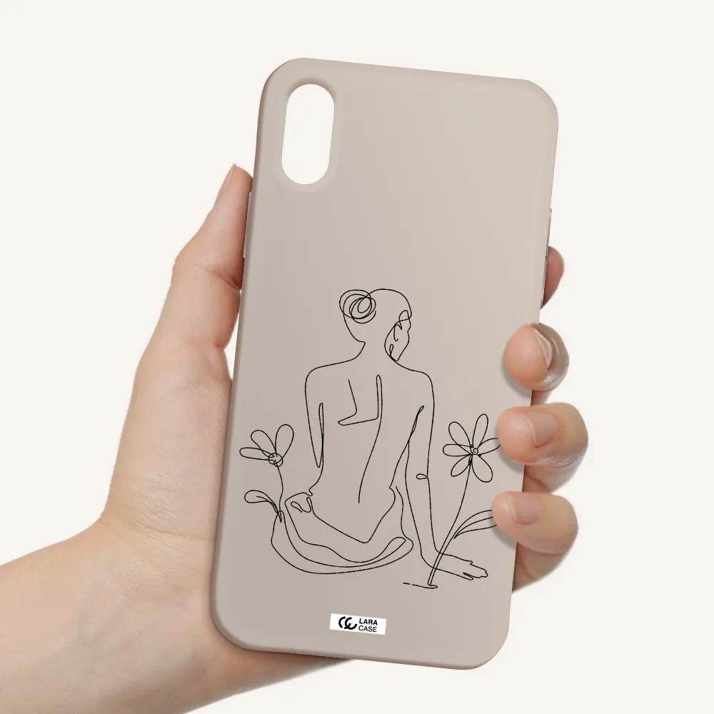 a woman sitting on a flower Apple iPhone X Silicone Stone Case