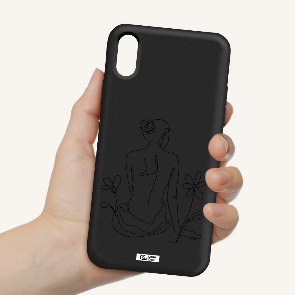 a woman sitting on a flower Apple iPhone XS Silicone black Case