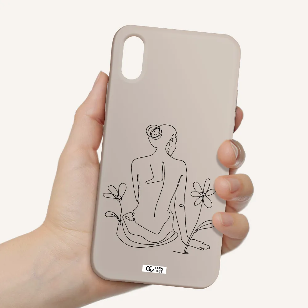 a woman sitting on a flower Apple iPhone XS Silicone Stone Case