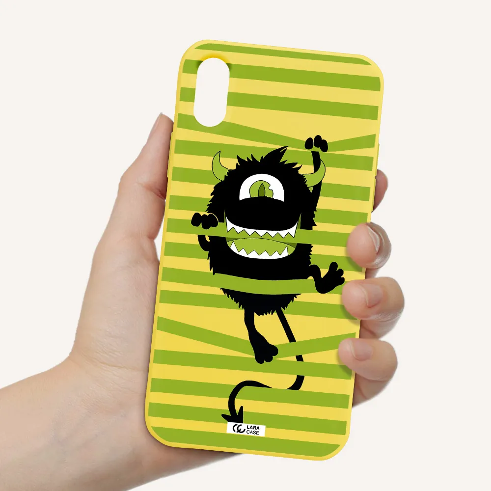 a black monster with horns and green stripes Apple iPhone XS Silicone canary yellow Case