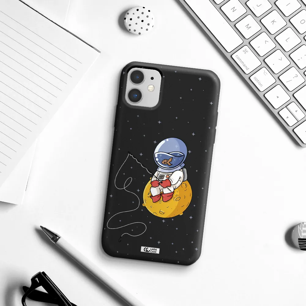 a cartoon of an astronaut sitting on a moon Apple iPhone 11 Silicone black Case