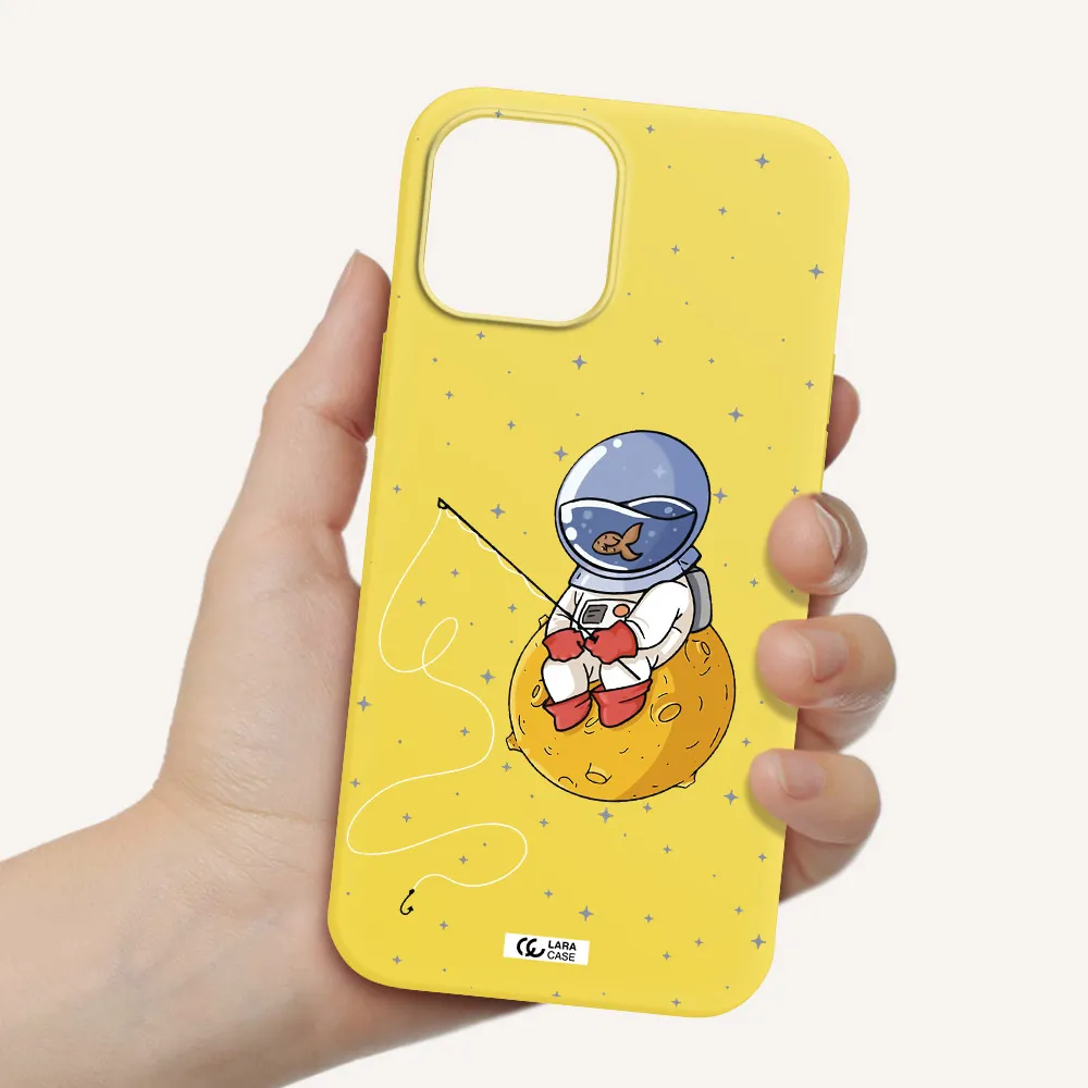 a cartoon of an astronaut sitting on a moon Apple iPhone 12 pro Silicone canary yellow Case