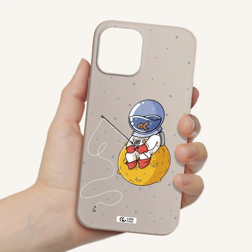 a cartoon of an astronaut sitting on a moon Apple iPhone 12 pro Silicone Stone Case