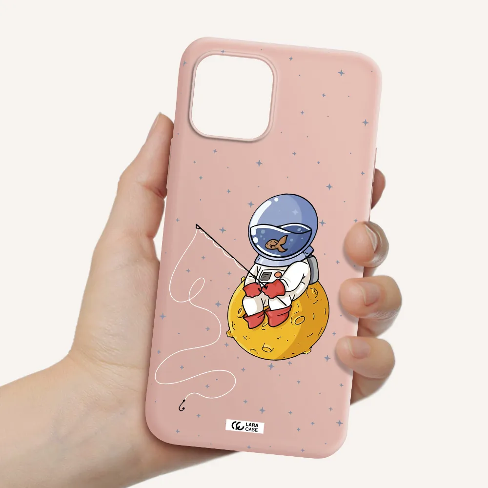 a cartoon of an astronaut sitting on a moon Apple iPhone 12 Silicone pastel pink Case