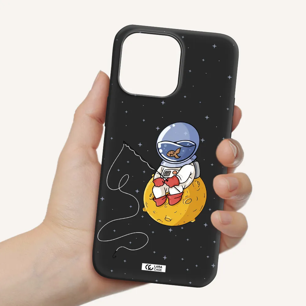 a cartoon of an astronaut sitting on a moon Apple iPhone 14 pro max Silicone black Case