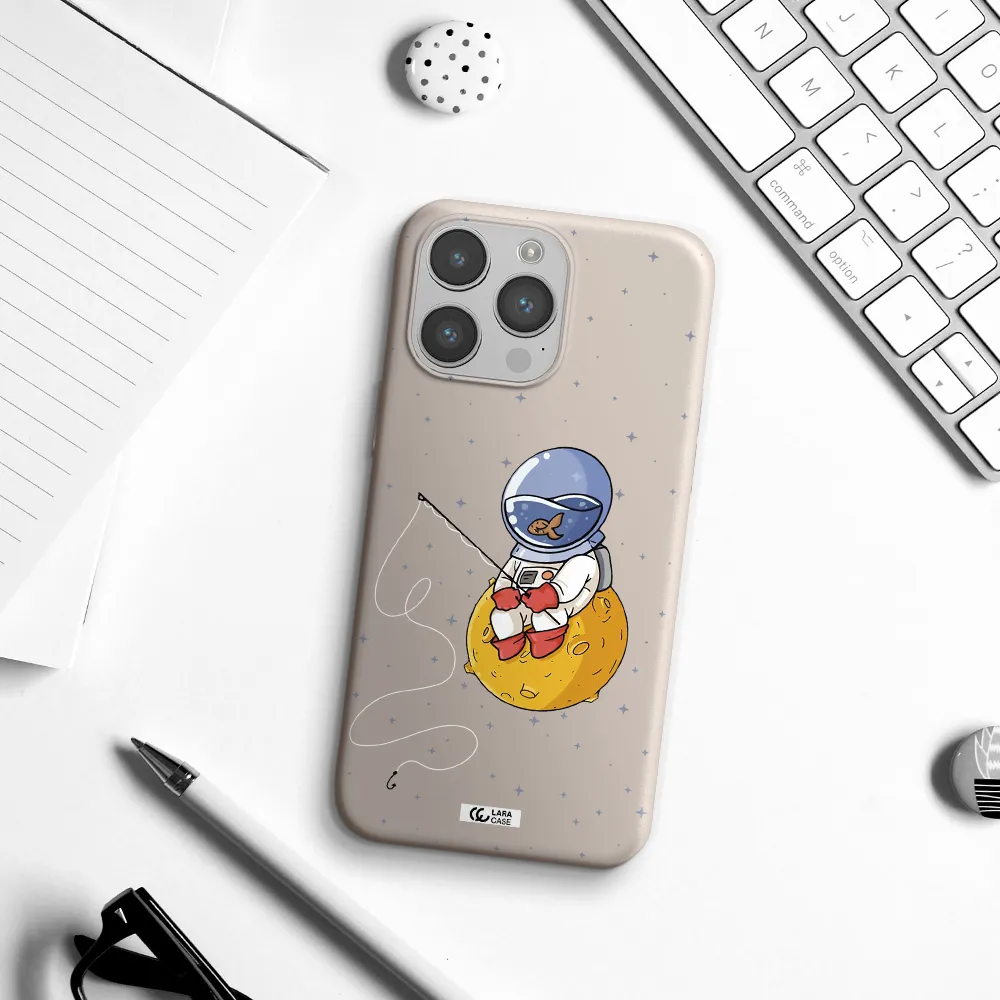 a cartoon of an astronaut sitting on a moon Apple iPhone 14 pro max Silicone Stone Case