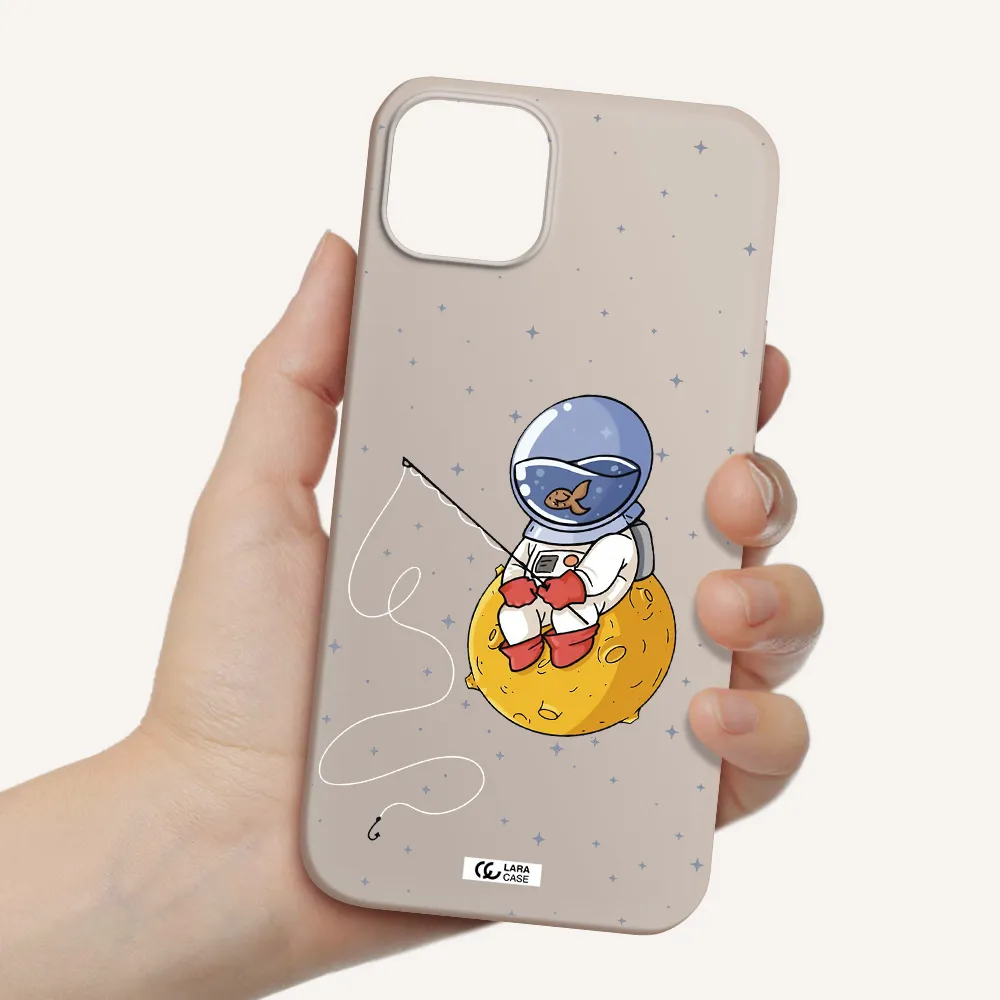 a cartoon of an astronaut sitting on a moon Apple iPhone 14 Silicone Stone Case