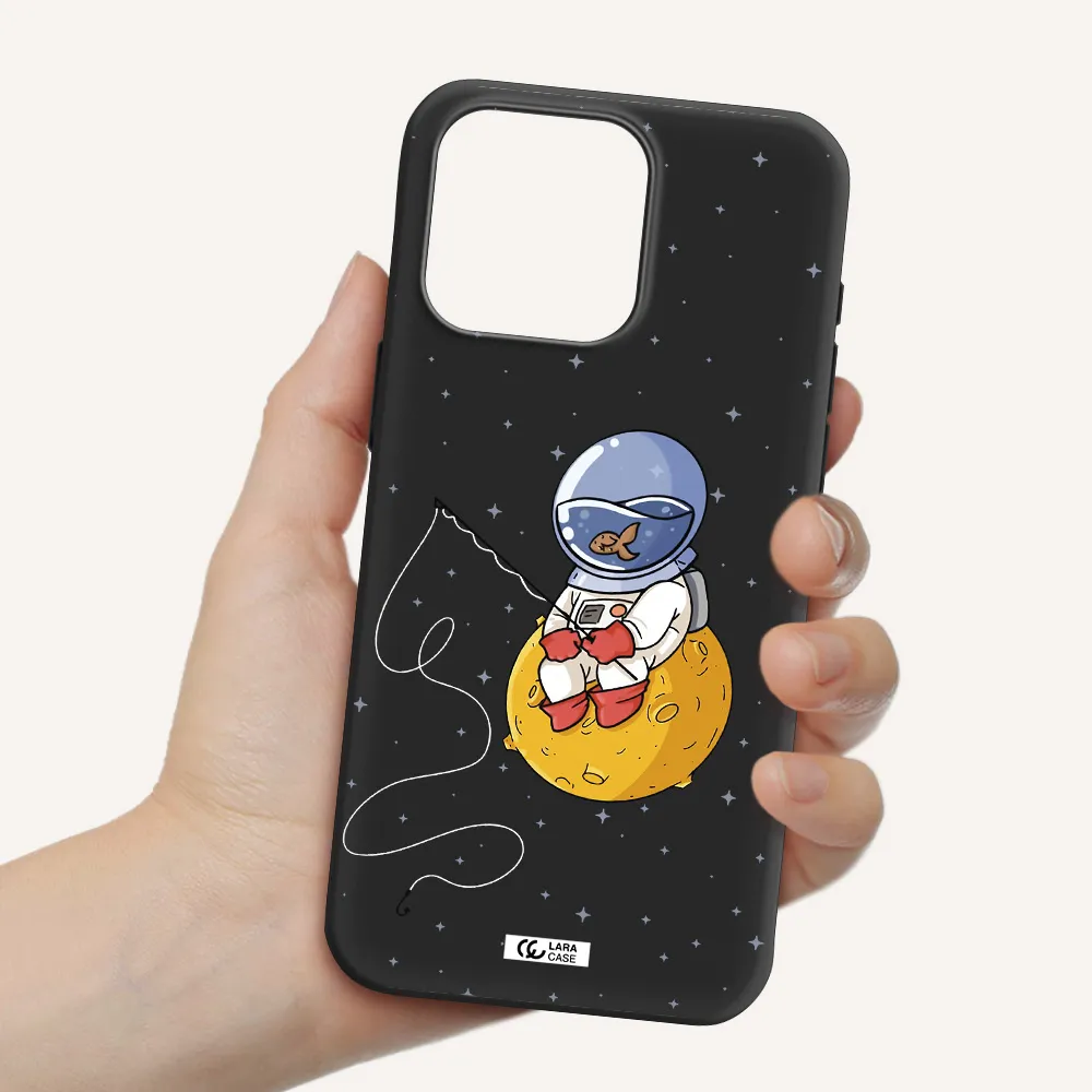 a cartoon of an astronaut sitting on a moon Apple Iphone 15 Pro max Silicone black Case