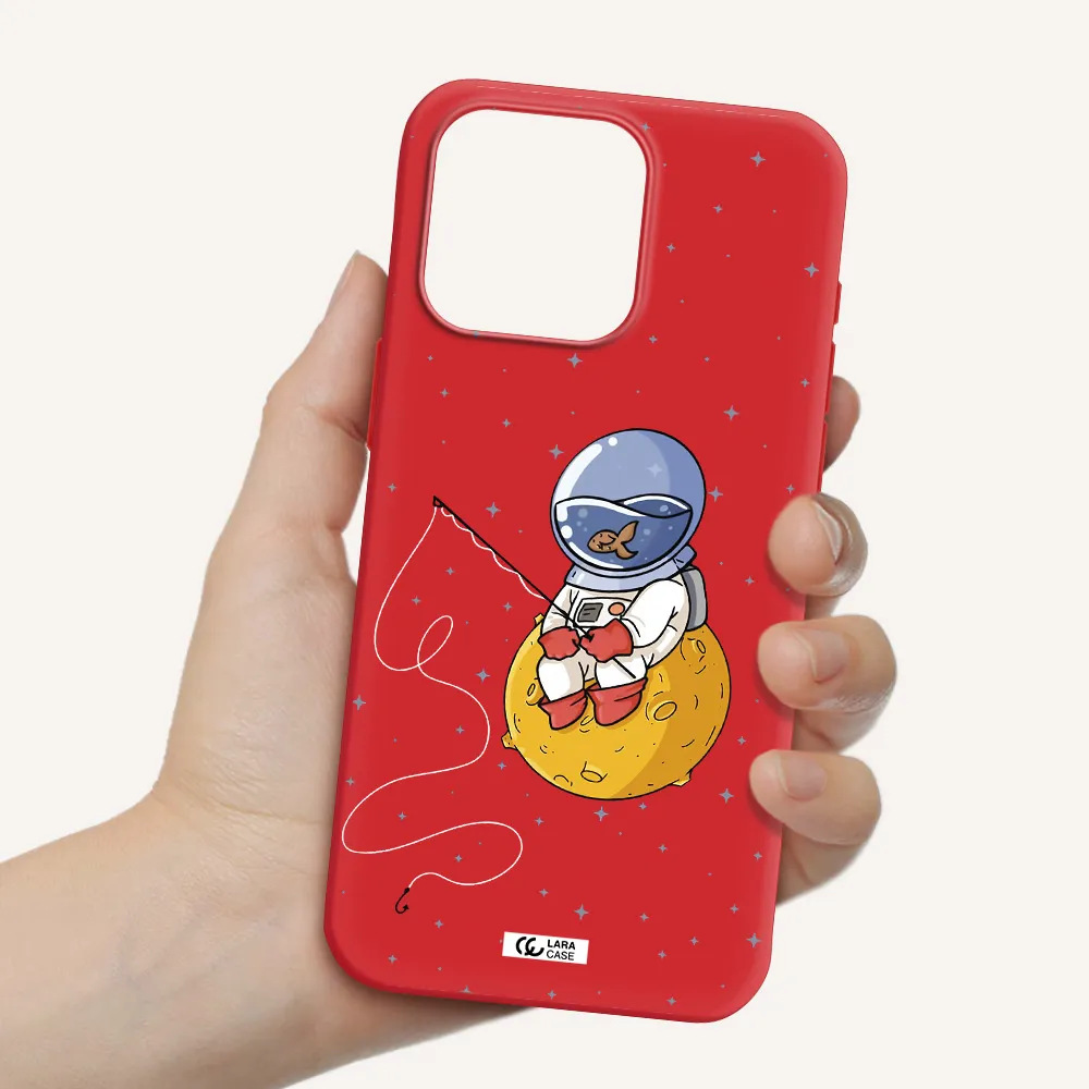 A Cartoon Of An Astronaut Sitting On A Moon Apple Iphone 15 Pro Max Silicone Imperial Red Case
