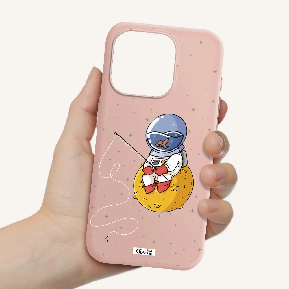 A Cartoon Of An Astronaut Sitting On A Moon Apple Iphone 15 Pro Silicone Pastel Pink Case