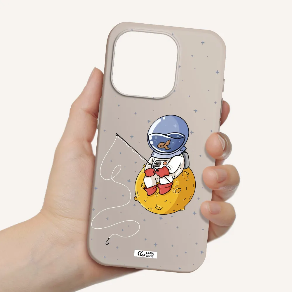 A Cartoon Of An Astronaut Sitting On A Moon Apple Iphone 15 Pro Silicone Stone Case