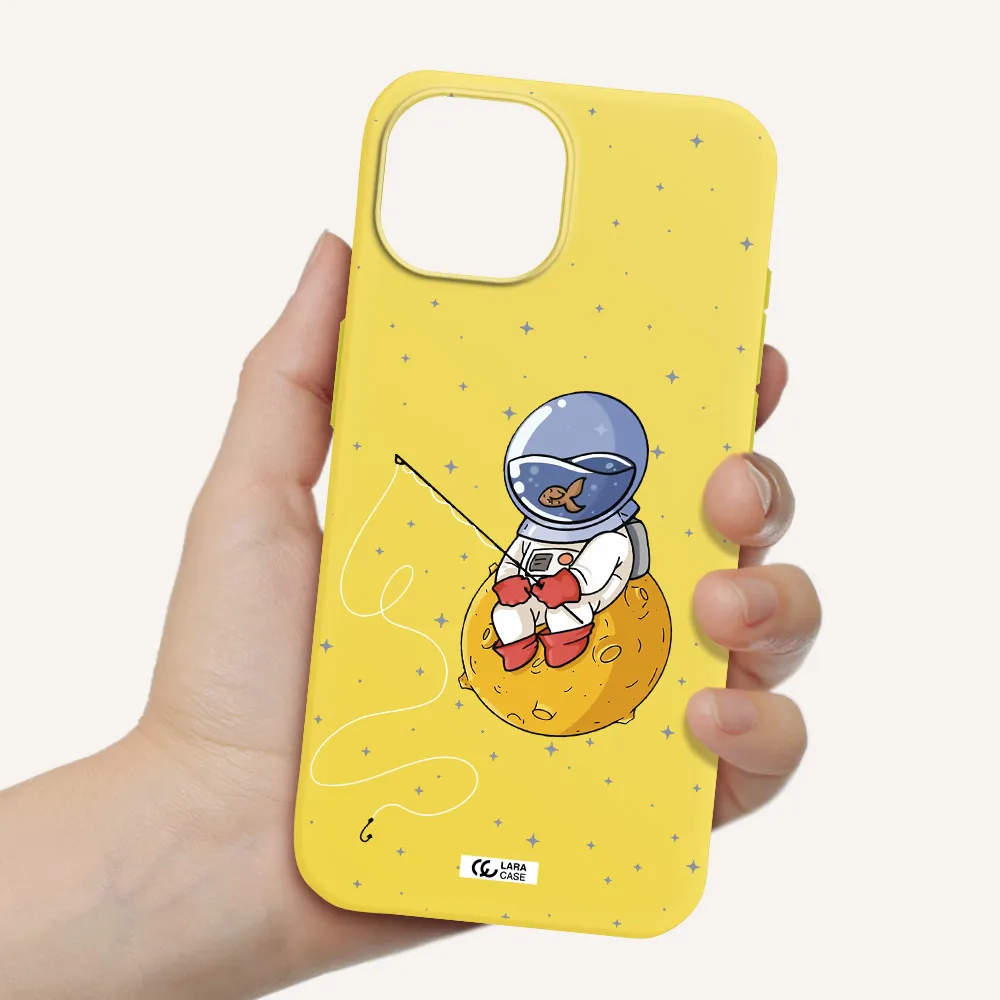 a cartoon of an astronaut sitting on a moon Apple iPhone 15 Silicone canary yellow Case