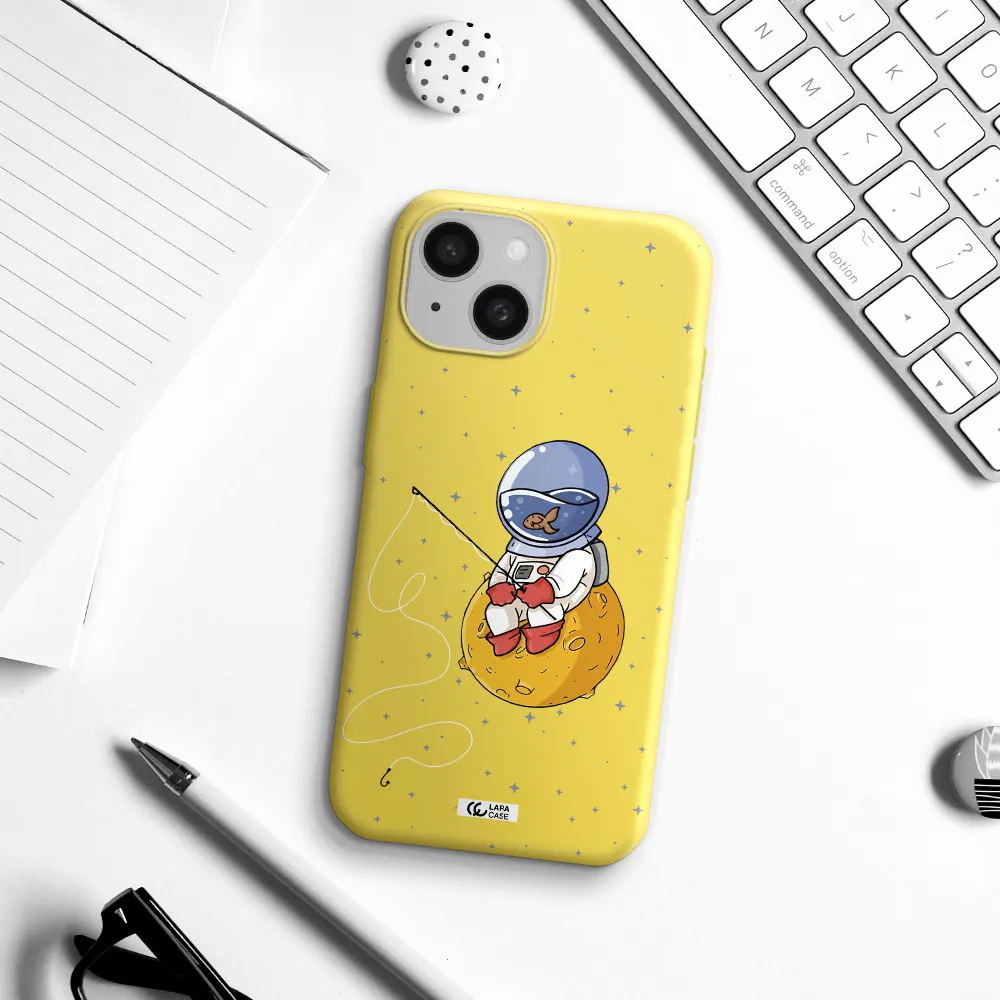 a cartoon of an astronaut sitting on a moon Apple iPhone 15 Silicone canary yellow Case