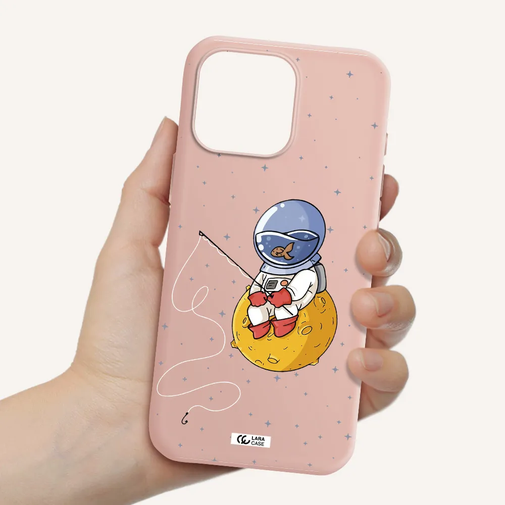 A Cartoon Of An Astronaut Sitting On A Moon Apple Iphone 16 Pro Max Silicone Pastel Pink Case