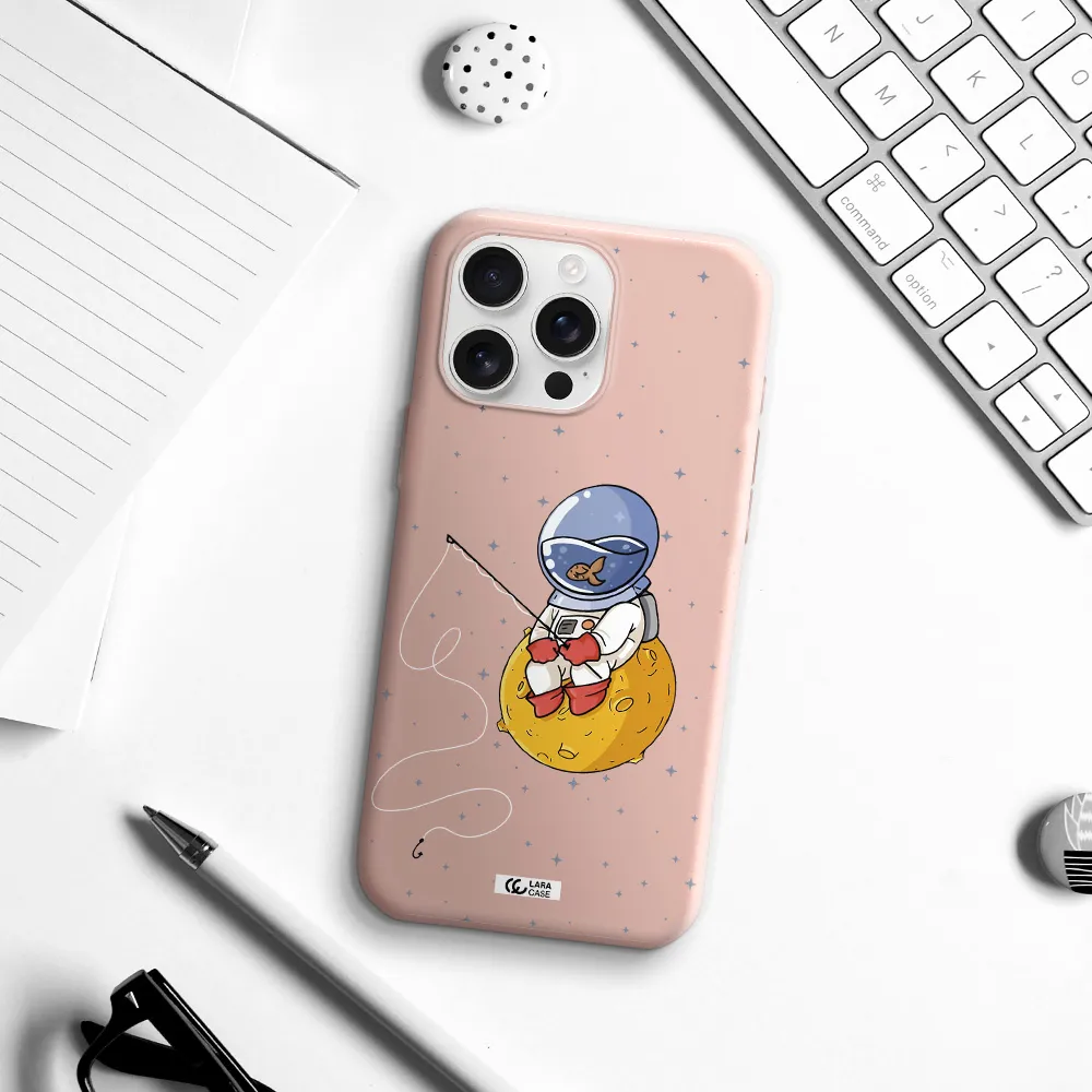 A Cartoon Of An Astronaut Sitting On A Moon Apple Iphone 16 Pro Max Silicone Pastel Pink Case