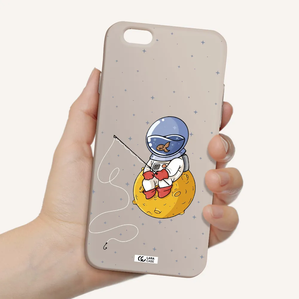 a cartoon of an astronaut sitting on a moon Apple iPhone 6 Silicone Stone Case