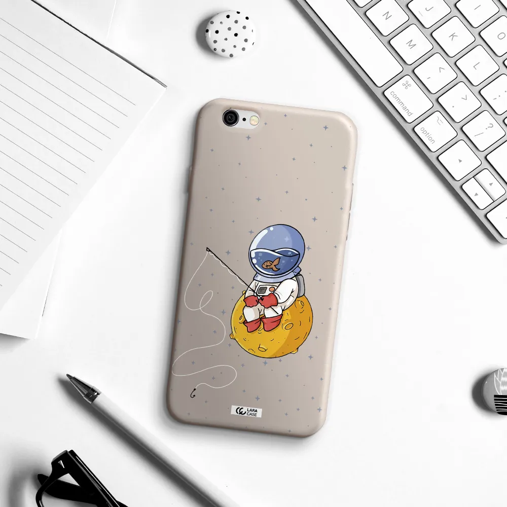 a cartoon of an astronaut sitting on a moon Apple iPhone 6 Silicone Stone Case