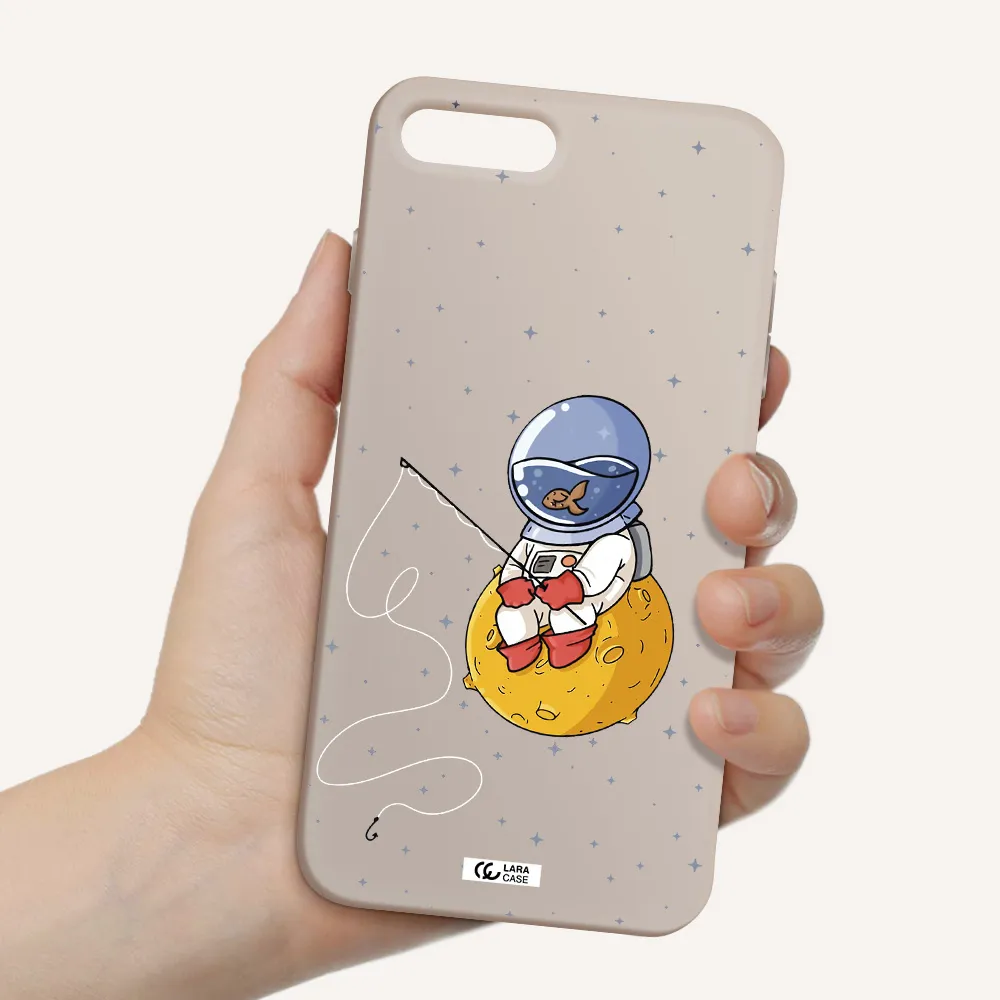 a cartoon of an astronaut sitting on a moon Apple iPhone 7 plus Silicone Stone Case