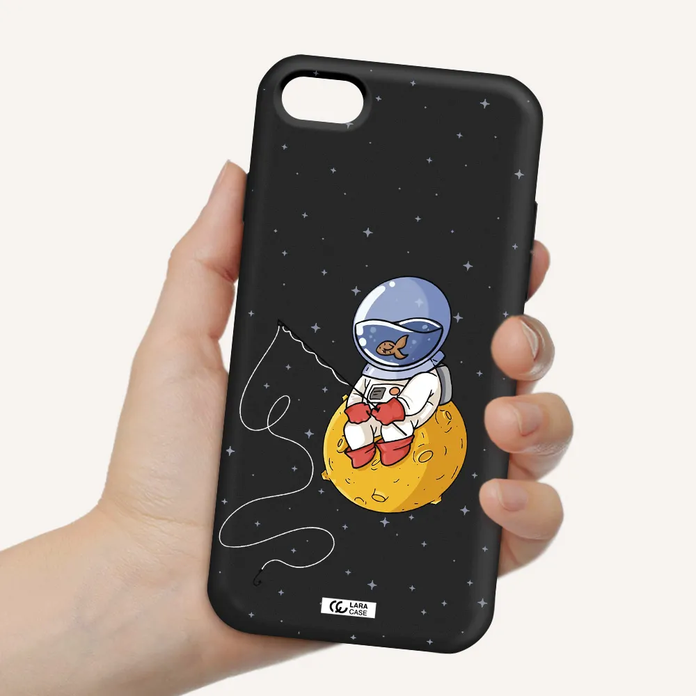 a cartoon of an astronaut sitting on a moon Apple iPhone 7 Silicone black Case