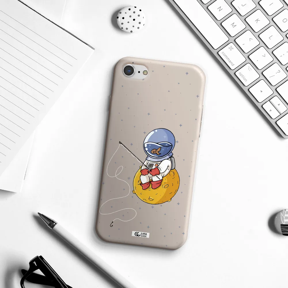 a cartoon of an astronaut sitting on a moon Apple iPhone 7 Silicone Stone Case