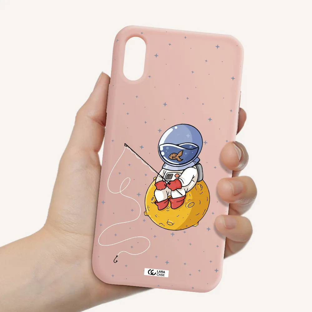 a cartoon of an astronaut sitting on a moon Apple iPhone X Silicone pastel pink Case
