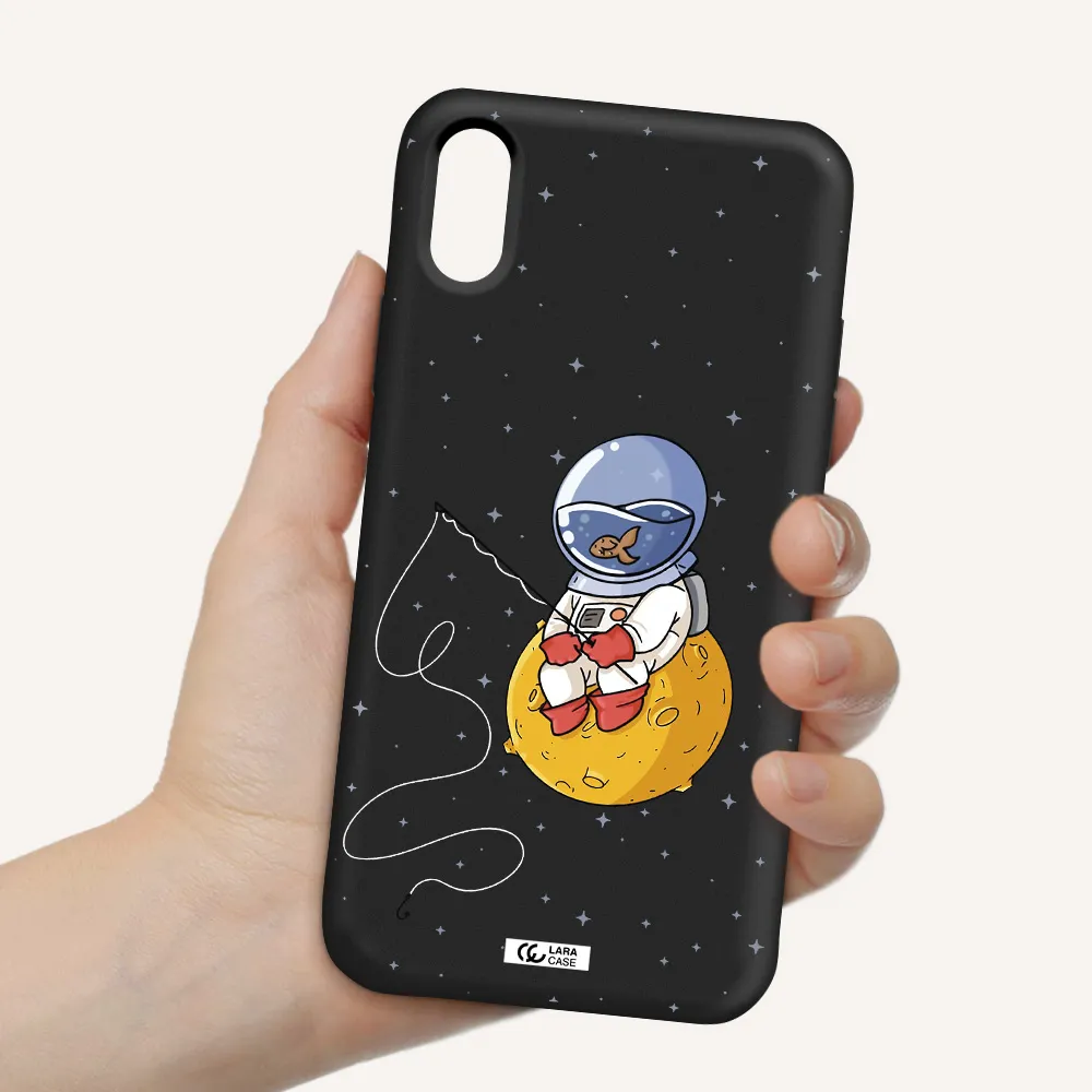 a cartoon of an astronaut sitting on a moon Apple iPhone XS Silicone black Case