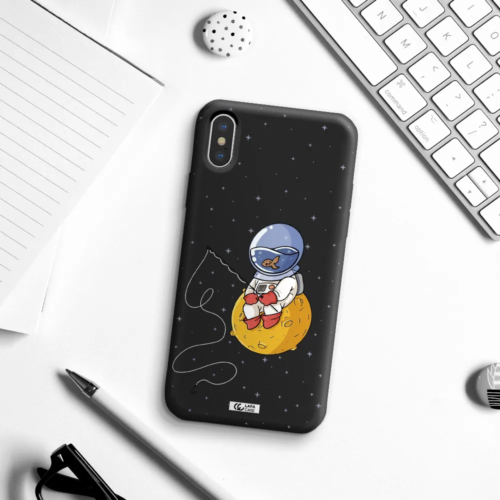 a cartoon of an astronaut sitting on a moon Apple iPhone XS Silicone black Case