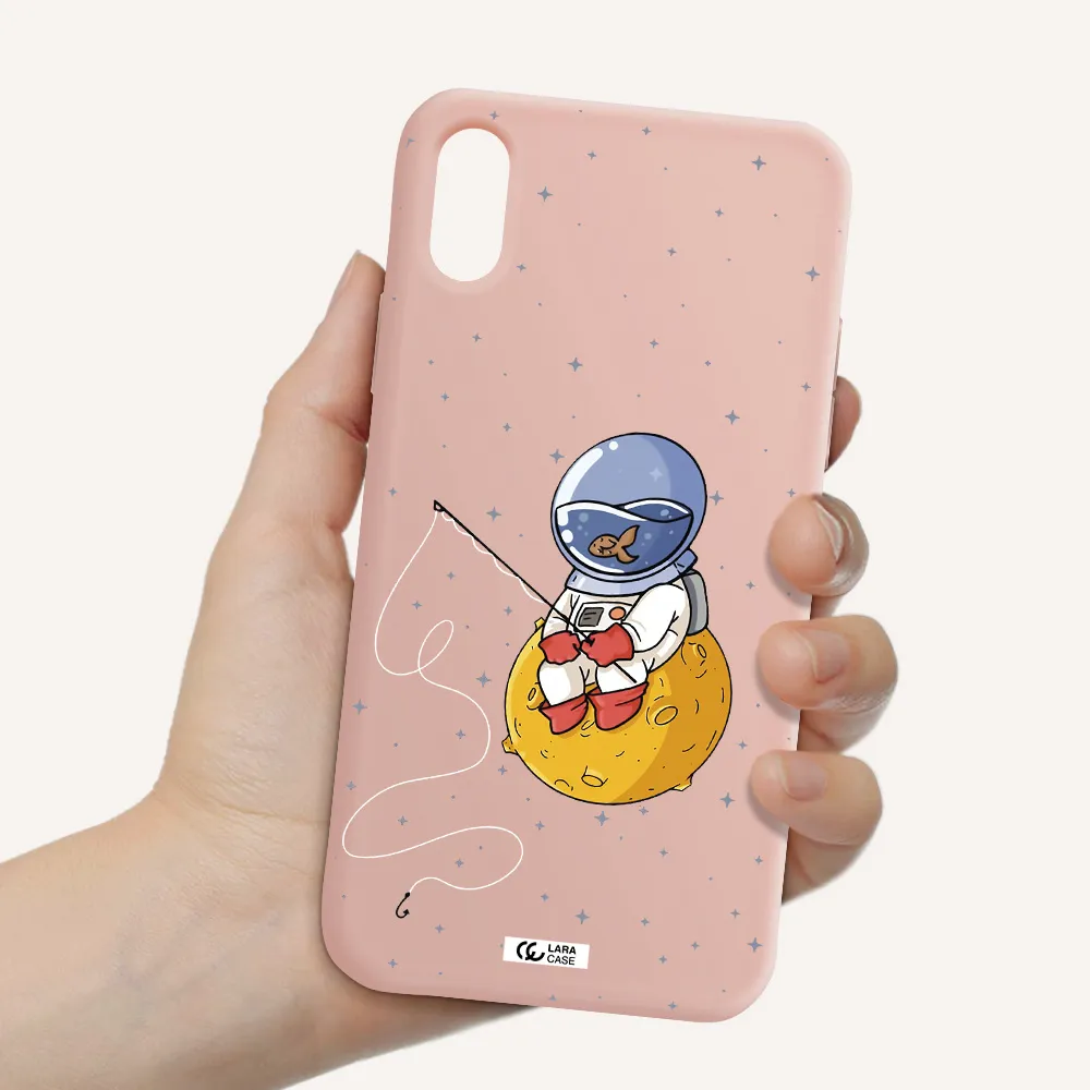 a cartoon of an astronaut sitting on a moon Apple iPhone XS Silicone pastel pink Case