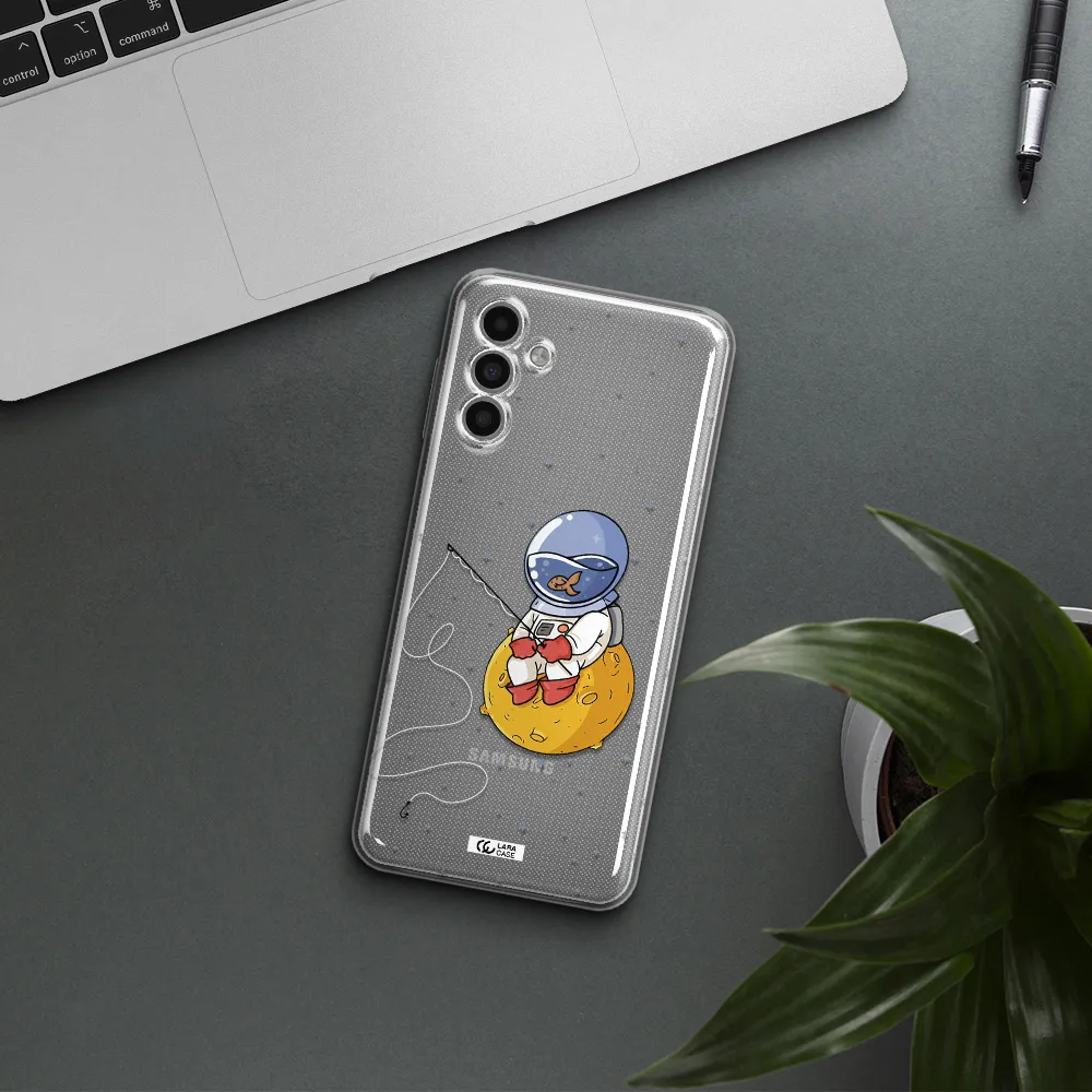 A Cartoon Of An Astronaut Sitting On A Moon Samsung A13 5G Clear Tpu Case