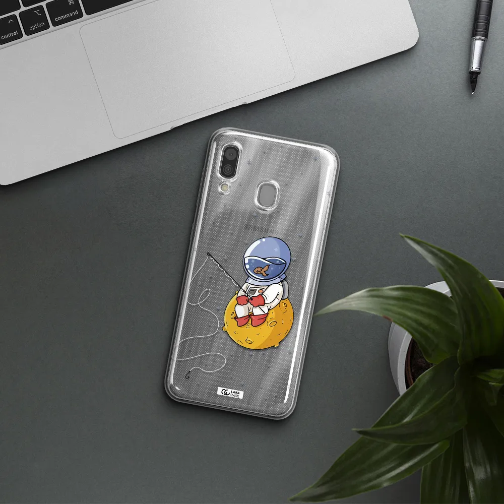 a cartoon of an astronaut sitting on a moon Samsung A30 Clear TPU Case