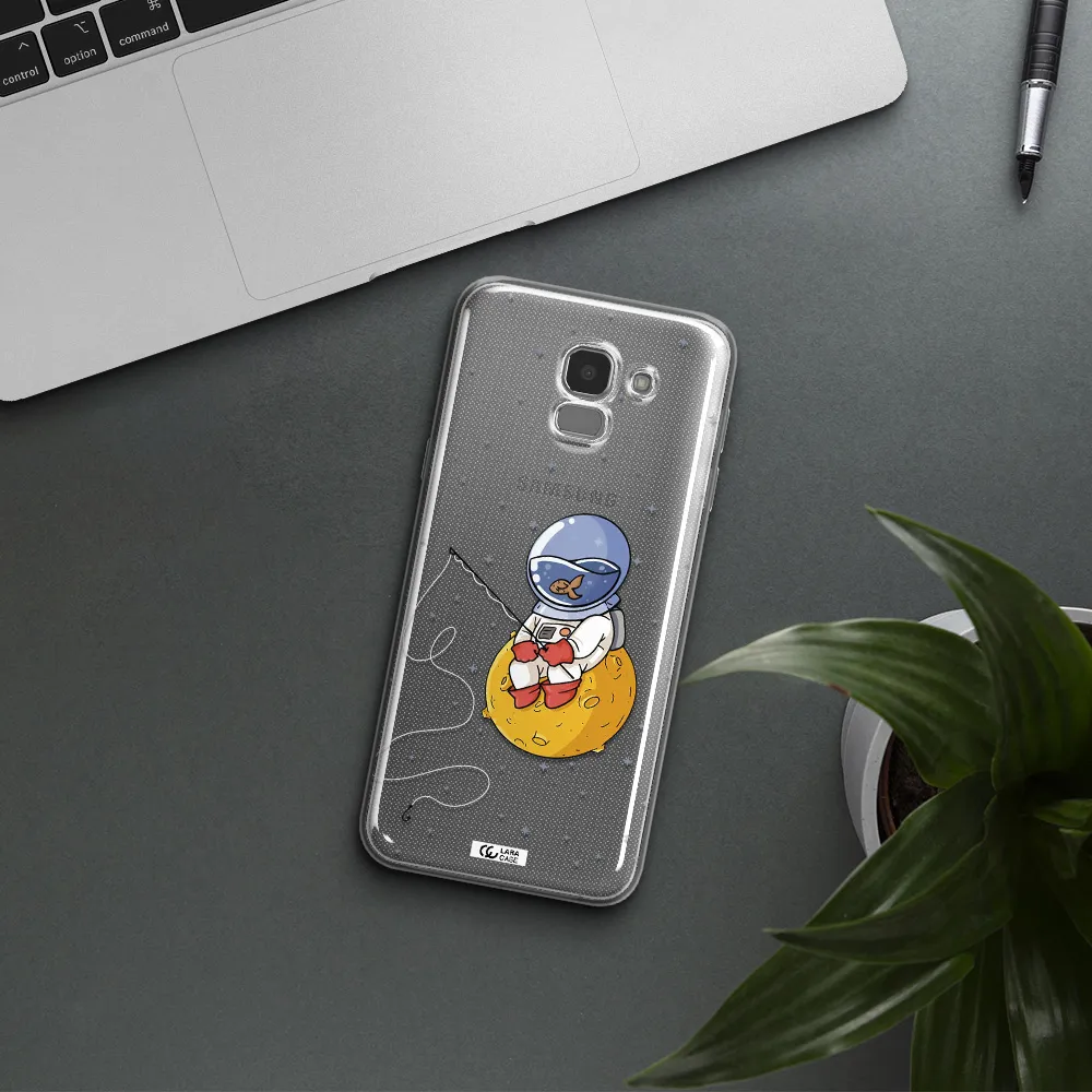 a cartoon of an astronaut sitting on a moon Samsung J6 Clear TPU Case