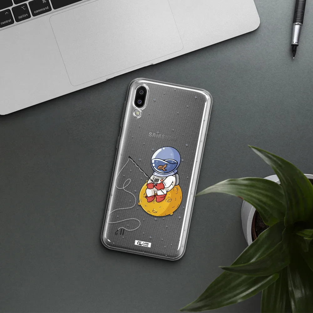 a cartoon of an astronaut sitting on a moon Samsung M10 Clear TPU Case
