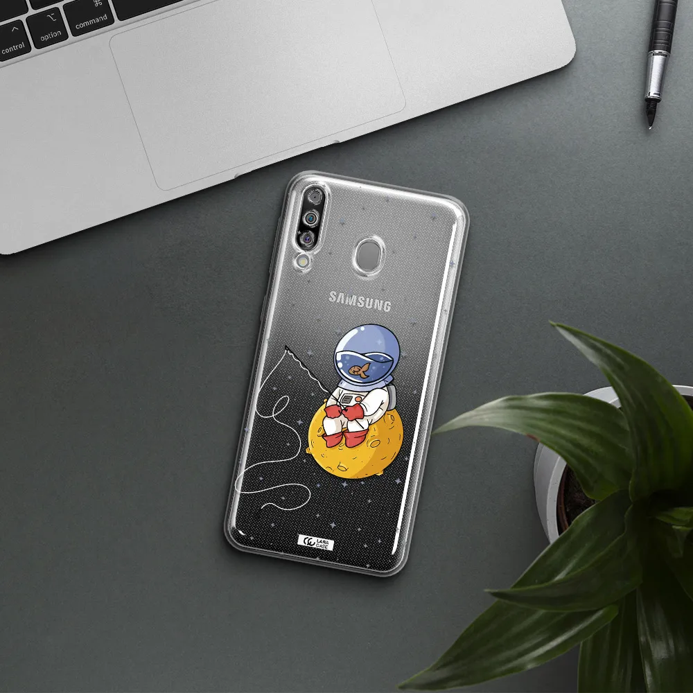 a cartoon of an astronaut sitting on a moon Samsung M30 Clear TPU Case
