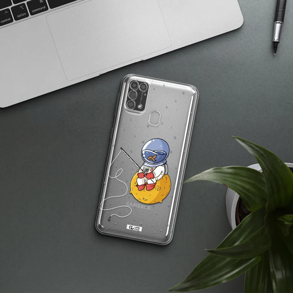 a cartoon of an astronaut sitting on a moon Samsung M31 Clear TPU Case