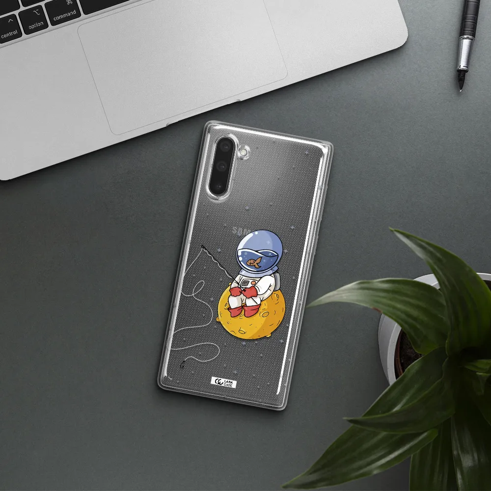 a cartoon of an astronaut sitting on a moon Samsung Note 10 Clear TPU Case