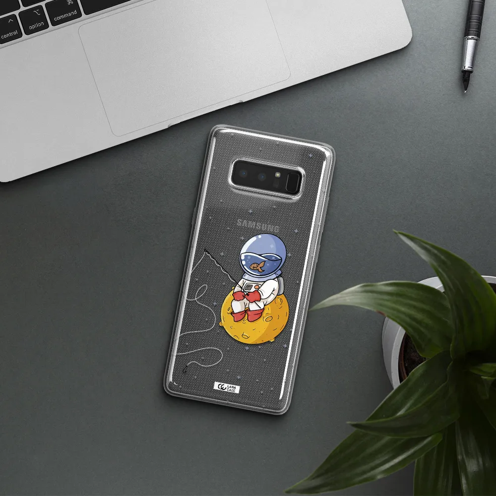 a cartoon of an astronaut sitting on a moon Samsung Note 8 Clear TPU Case