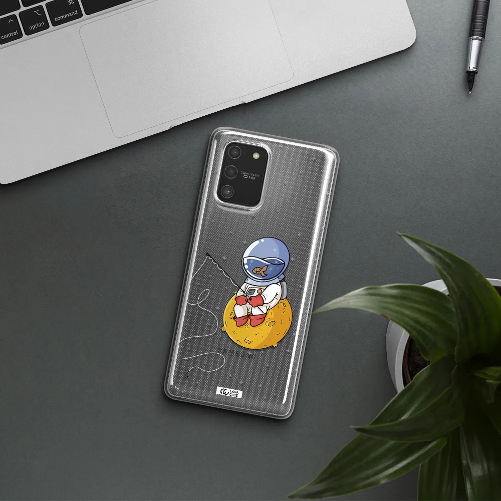a cartoon of an astronaut sitting on a moon Samsung S10 Lite Clear TPU Case