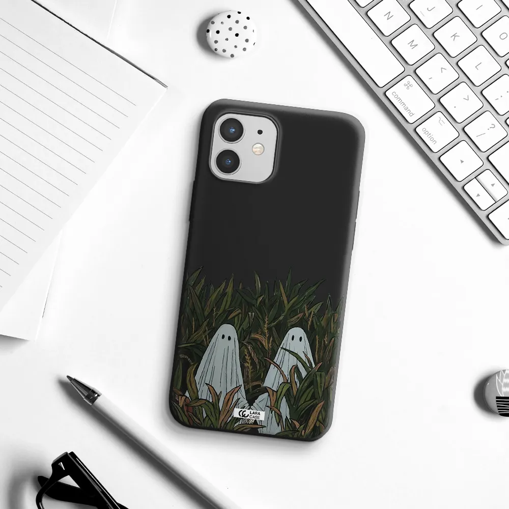 a group of ghosts in a field of grass Apple iPhone 12 Silicone black Case