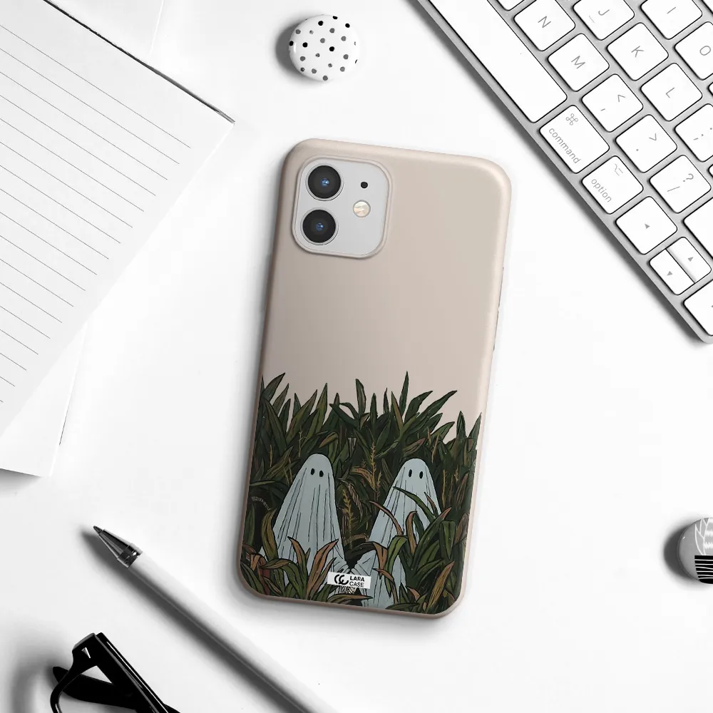 a group of ghosts in a field of grass Apple iPhone 12 Silicone Stone Case