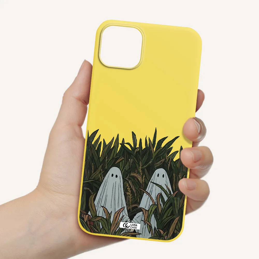 a group of ghosts in a field of grass Apple iPhone 14 Silicone canary yellow Case