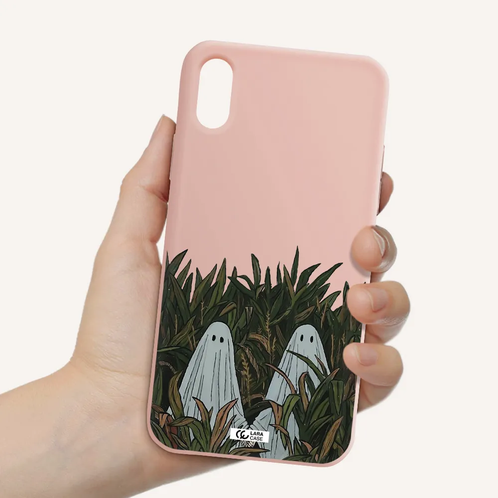 a group of ghosts in a field of grass Apple iPhone XS Silicone pastel pink Case