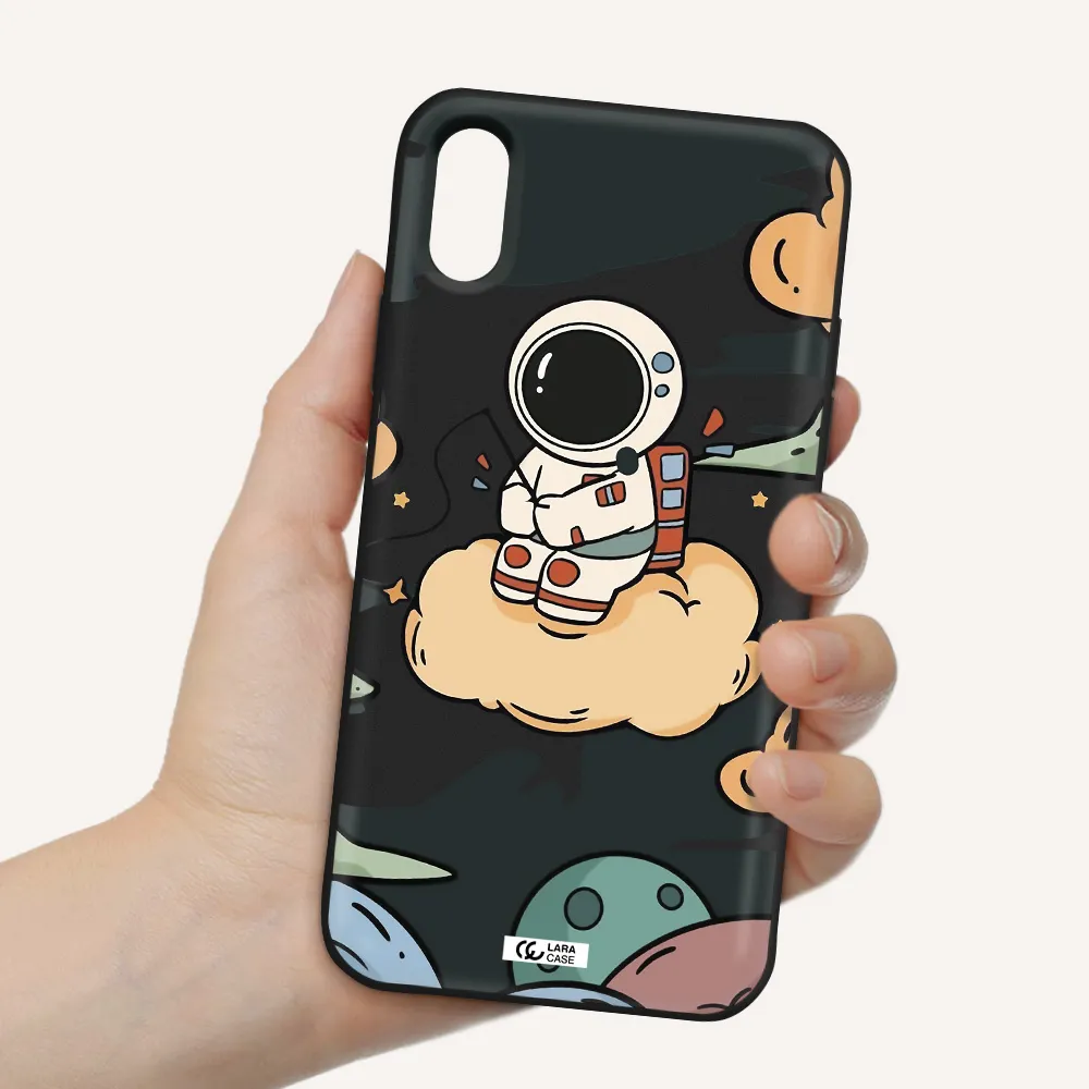 a cartoon astronaut sitting on a cloud Apple iPhone XS Silicone black Case