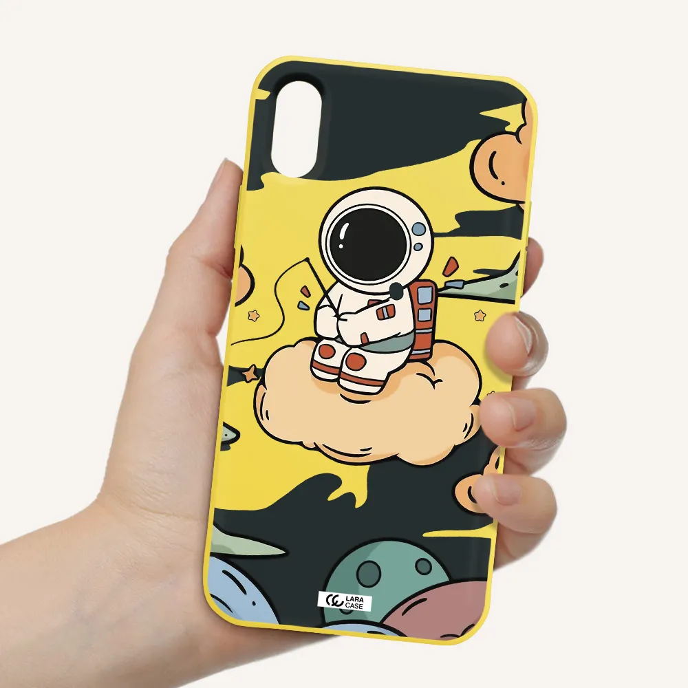 a cartoon astronaut sitting on a cloud Apple iPhone XS Silicone canary yellow Case