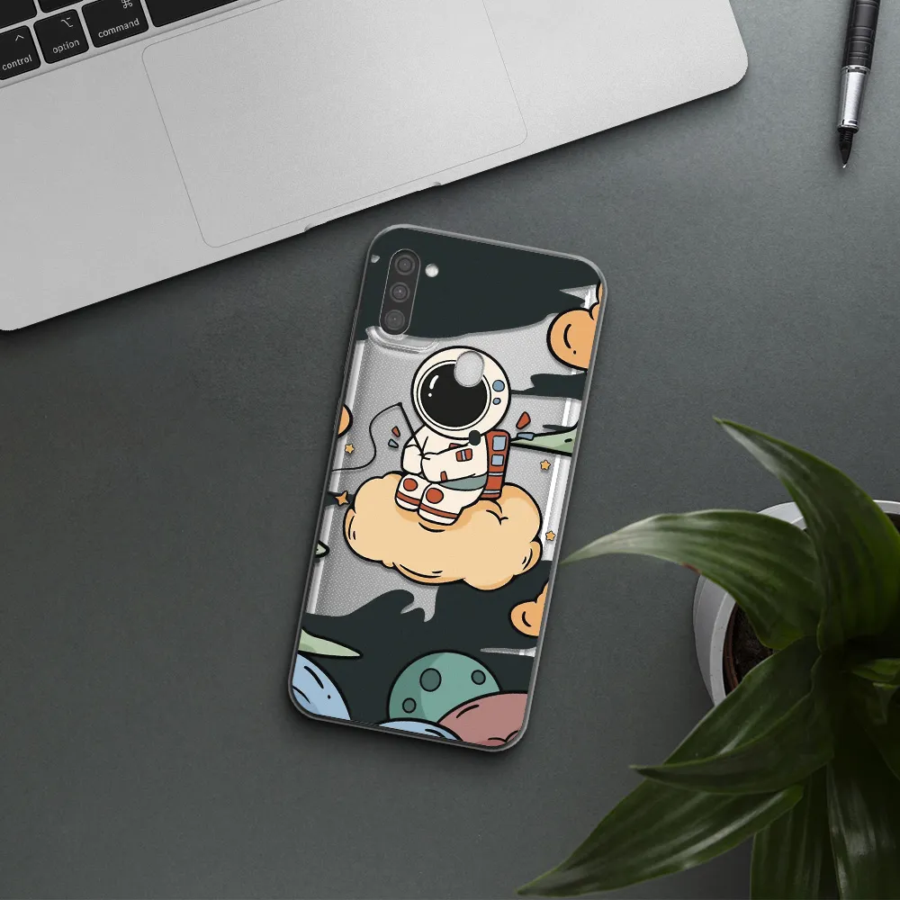 a cartoon astronaut sitting on a cloud Samsung M11 Clear TPU Case